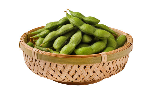 Heap of fresh green edamame pods in woven bamboo basket