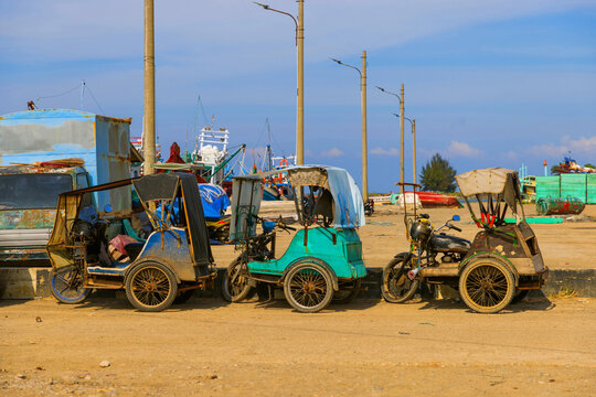 Motorized becak parked at Banda Aceh fishing harbor
