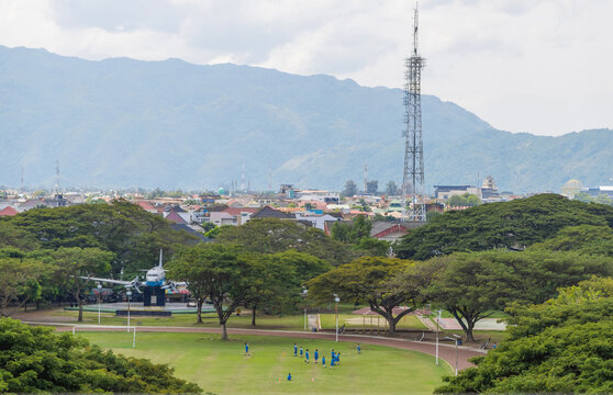 Banda Aceh skyline with telecom tower and mountain view