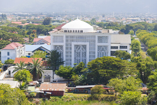 Modern mosque architecture overlooking Banda Aceh cityscape