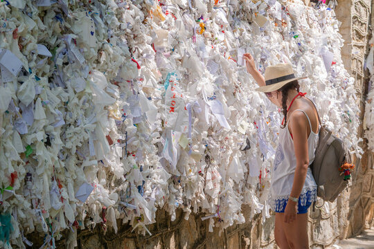 Woman traveler at the wish wall near Ephesus, Turkey