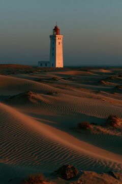 Lighthouse in the middle of desert.