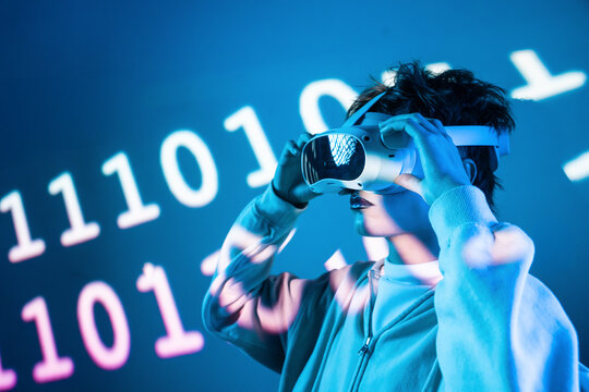 Young woman in vr headset with cyberpunk data light