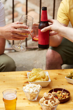 Spanish vermouth aperitif with tapas and drinks outdoors