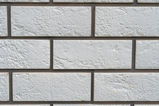 White brick wall texture background with rough surface