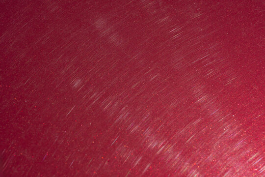 Sparkling red textured background with subtle highlights