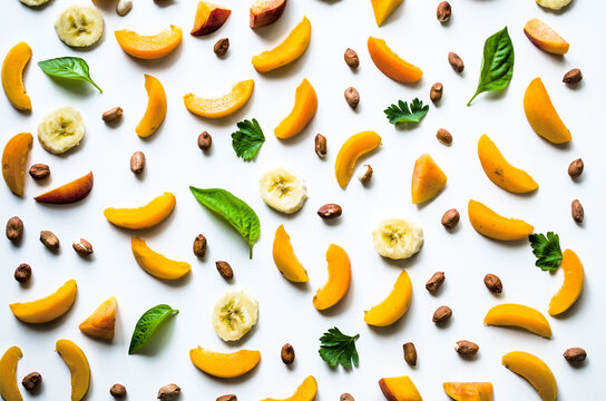 Fruit and nut pattern on white background
