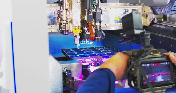 Filming commercials for microelectronic products.