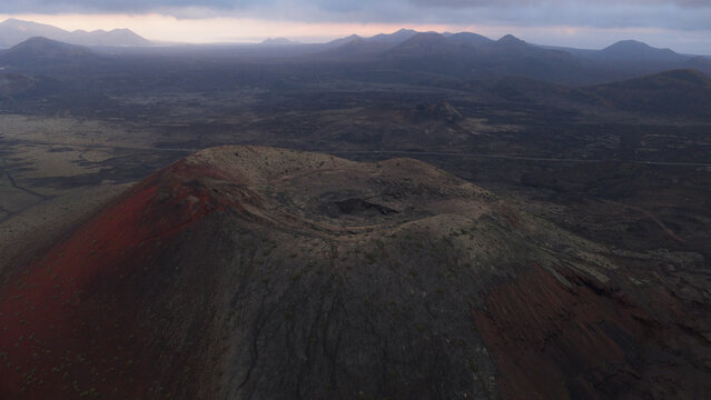 Dramatic volcanic landscape in lanzarote at sunset