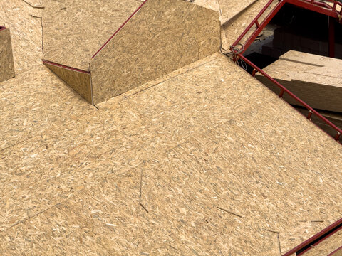 Roof construction with OSB sheathing before tile installation