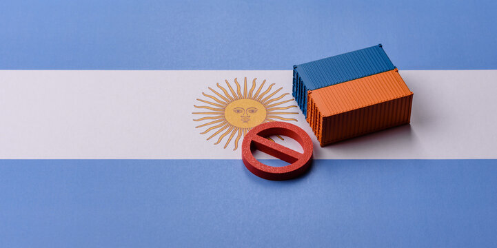 The cargo container ban on the Argentina flag as a conceptual backdrop. The cargo container embargo