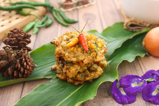 Bakwan jagung, also called dadar jagung, is an Indonesian fritter made from mashed corn kernels and spices, deep-fried until golden, firm, and crispy. It&rsquo;s a favorite side dish enjoyed nationwide.
