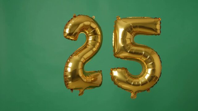 Golden inflatable balloons in the shape of number 25 floating and rotating against a solid green background. This bright festive element is perfect for a 25th birthday, silver anniversary