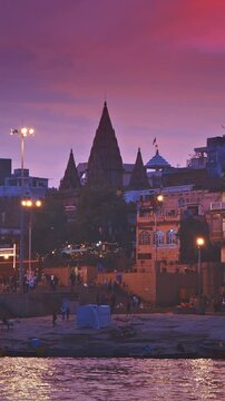Varanasi, India. Hundreds Of Tourists And Locals Gather On Boats To Watch Fire Ceremony Or Puja At Assi Ghat. Ganga Maha Aarti Ceremony. Traditional Ganga Aarti In Varanasi. Cinematic Camera Movement