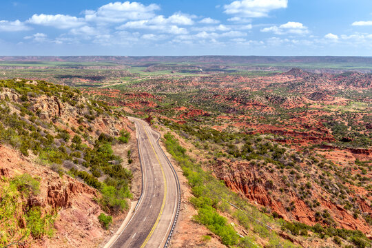 Highway through the famous Texas Palo Duro Canyon state park