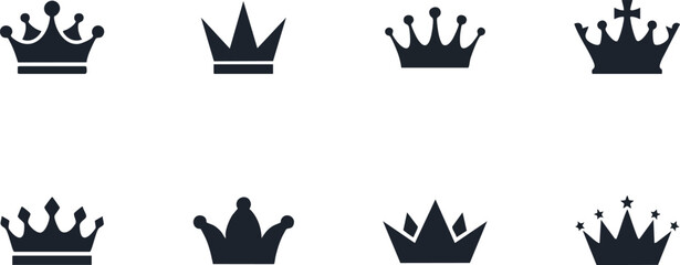 Set of silhouette crown icons and emblems representing royalty power and status in dark colors. © Zahangir