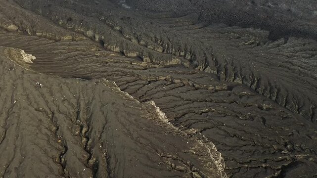 Aerial Over Eroded Volcanic Ash Field Revealing Krakatau Cone
