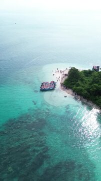 Aerial Of Island Point With Tour Boat And Snorkelers On Reef