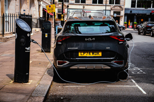 Kia Sportage EV Public On-Street Charger, Hybrid Electric Vehicle Supply Equipment, EVSE, Car Plugged Into TotalEnergies Charging Station, London, England, UK &ndash; June 2026