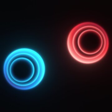 Glowing Neon Blue and Red Rings Orbiting Seamless Loop