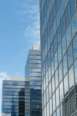 Obraz premium Brussels, Belgium. Modern glass office buildings with layered perspective and reflections of telecommunications tower