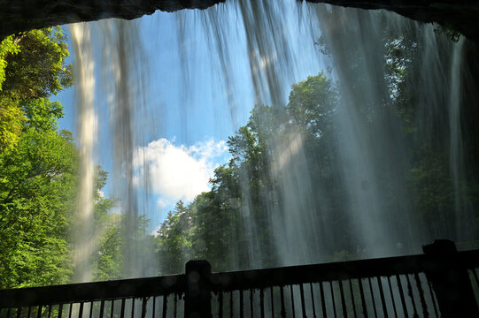 Behind Dry Falls, Highlands NC - walking behind a mountain cascading waterfall