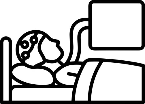 Person Undergoing EEG Test in Bed with Monitor