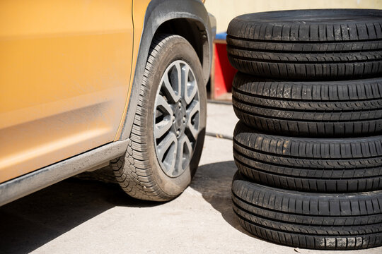 Changing car tires according to the season. 