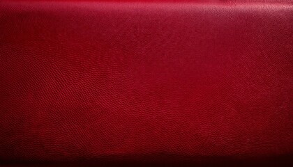 Fototapeta premium a textured close up of a deep red surface the texture shows subtle variations in tone creating a rough tactile impression light