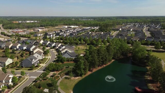 Aerial flyover shot of new Wendell Falls housing development in Wendell, North Carolina, near Raleigh
