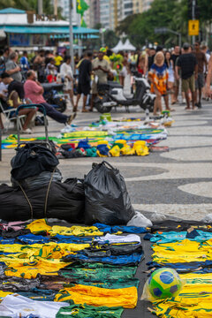 Rio de Janeiro, Brazil - 13 June 2026: View of street vendors selling Brazil national football team jerseys and merchandise on the iconic Copacabana sidewalk during the World Cup 2026.