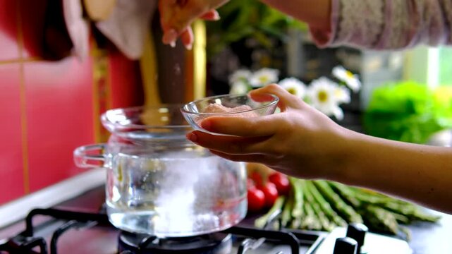 Healthy homemade breakfast with scrambled eggs and asparagus step by step cooking recipe on modern kitchen countertop with fresh summer atmosphere
