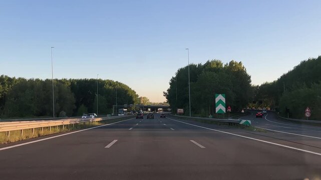 Amsterdam Netherlands highway, Light traffic on a multi lane motorway at sunset