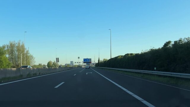 Amsterdam Netherlands highway, Amsterdam motorway with overhead direction signs and light traffic
