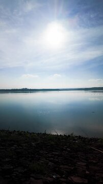 Explore Ho Cau Moi in Dong Nai, Vietnam with views of the water and sky