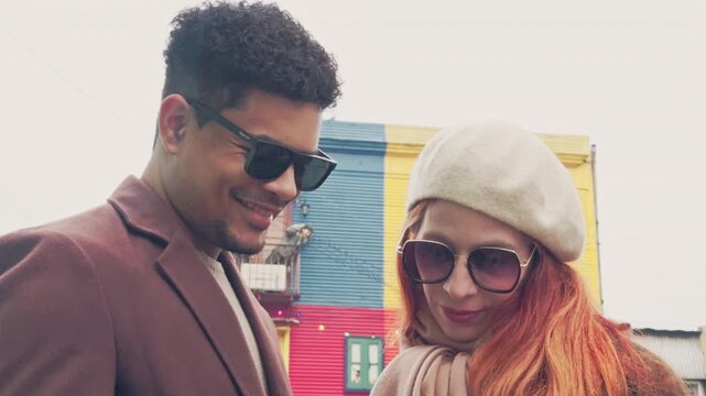 Romantic couple flirting and smiling in la boca