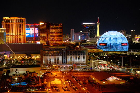 Las Vegas, Nevada, United States - July 5th, 2025: The sphere and las vegas buildings and casinos lit up at night