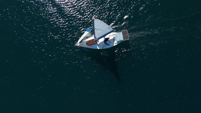 Aerial view of the sailing boat sailing in the sea near the islands close to the town of Paraty and Angra dos Reis in Brazil