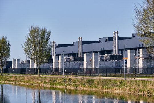 Middenmeer, Netherlands - 14 April 2026: View of the Microsoft Datacenter Western Europe at Agriport with emergency backup diesel powerplants and exhaust stacks along the units.