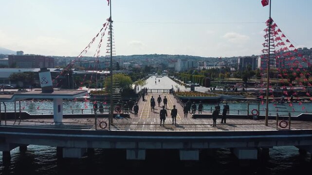 Aerial drone footage of the First Step (Ilkadim) monument and historical Tobacco Pier in Samsun, Turkey.