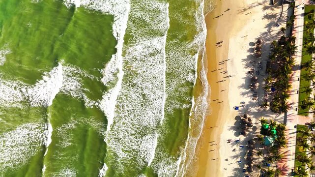 My Khe Beach, Da Nang, Vietnam &ndash; 4K aerial drone footage of tropical coastline, sandy beach, palm-lined coastline, ocean waves