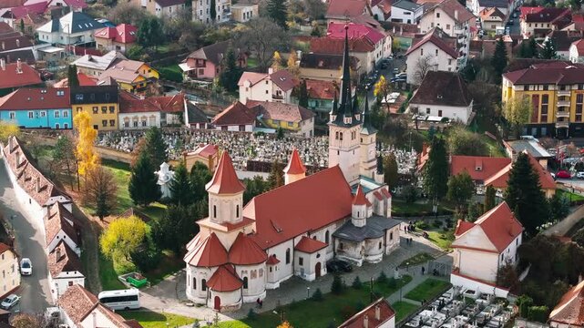 Aerial view of st nicholas church in brasov romania featuring historic orthodox architecture style.