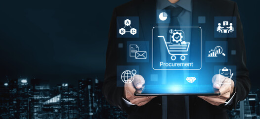 Obraz premium Businessman holding tablet showcasing digital procurement icons in modern city skyline representing technology and commerce evolution. Bitwise.