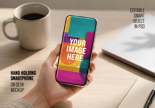 Hand Holding Smartphone On Desk Mockup