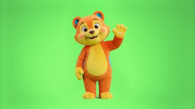 A cheerful 3D animated plush teddy bear mascot in orange and yellow tones standing and waving its hand in a friendly greeting. The character is isolated on a solid chroma key green screen background.