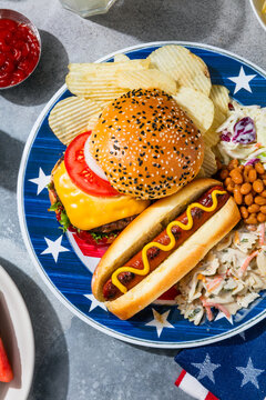 Patriotic Hot Dog and Cheeseburger with Beans and Pasta Salad