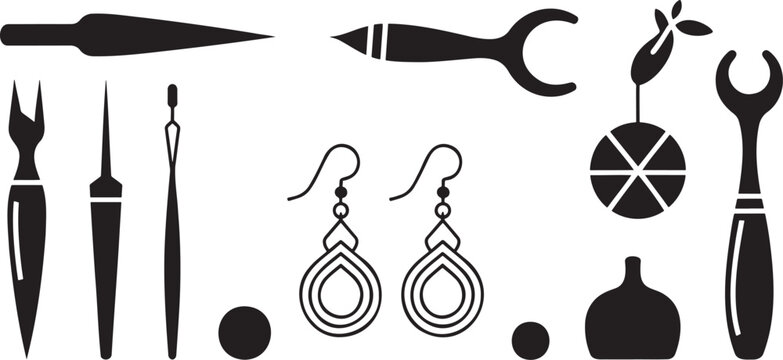 A collection of various jewelry making tools and elegant dangle earrings for creative craft projects