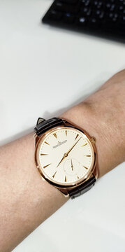 BANGKOK, THAILAND - APRIL 15 : Jaeger leCoultre Master Ultra Thin Collection with 18k gold case and alligator strap, round dial, small second, with ultra luxury gold precious case, wear on wrist, in B