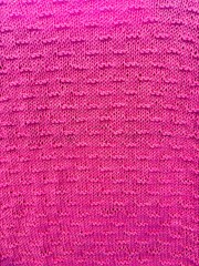 Fototapeta premium bright pink knit textured blanket 