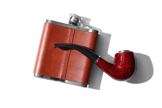 New hip flask and smoking pipe isolated on white background